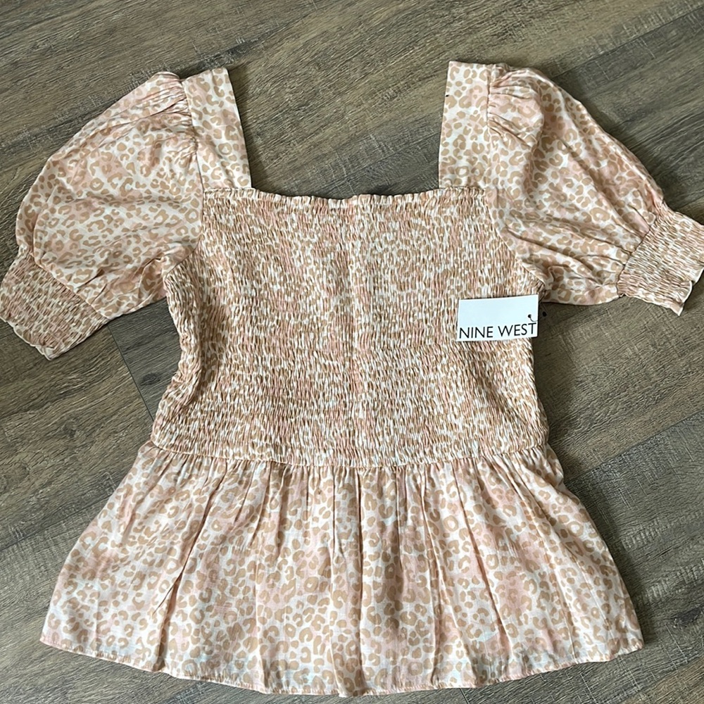 Pink cheetah print blouse